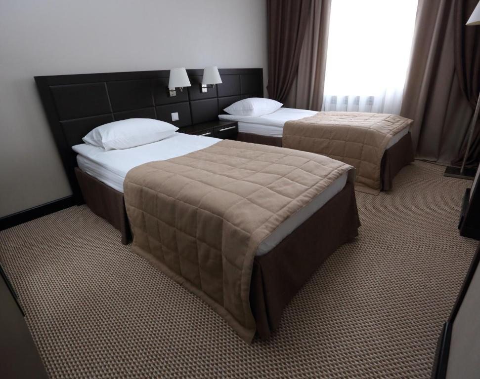 Двухместный (Стандартный двухместный номер с 2 отдельными кроватями) отеля Home Parq, Экибастуз