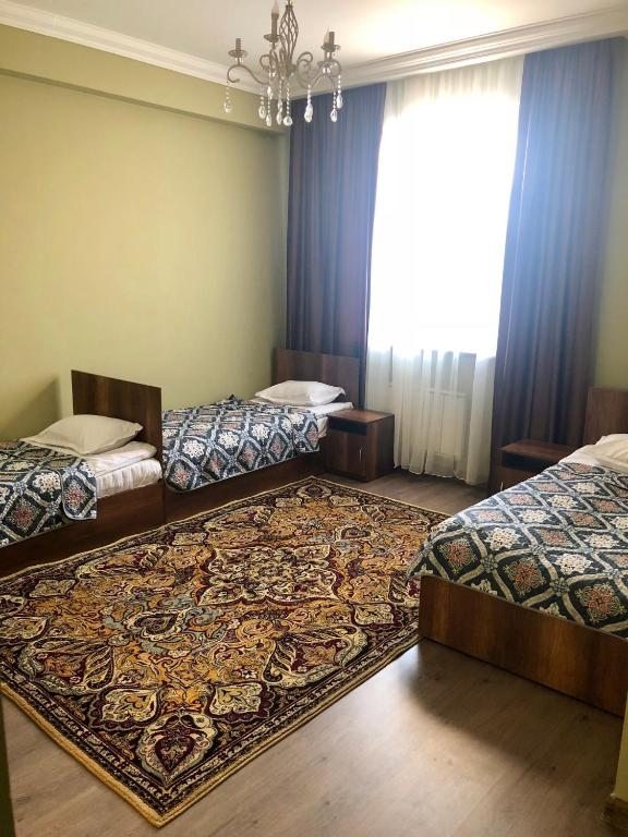 Двухместный (Двухместный номер Делюкс с 2 отдельными кроватями) отеля Satti, Жаркент