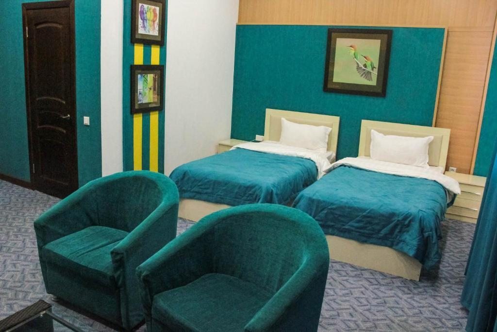 Двухместный (Двухместный номер с 2 отдельными кроватями и балконом) отеля Paradise, Сарыагаш