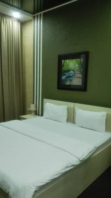 Двухместный (Двухместный номер с 1 кроватью или 2 отдельными кроватями) отеля Paradise, Сарыагаш