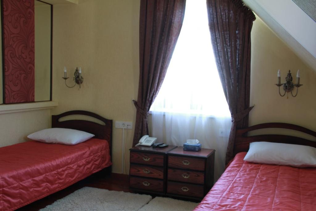 Двухместный (Стандартный двухместный номер с 2 отдельными кроватями) отеля Рейкьявик Алматы, Бескайнар