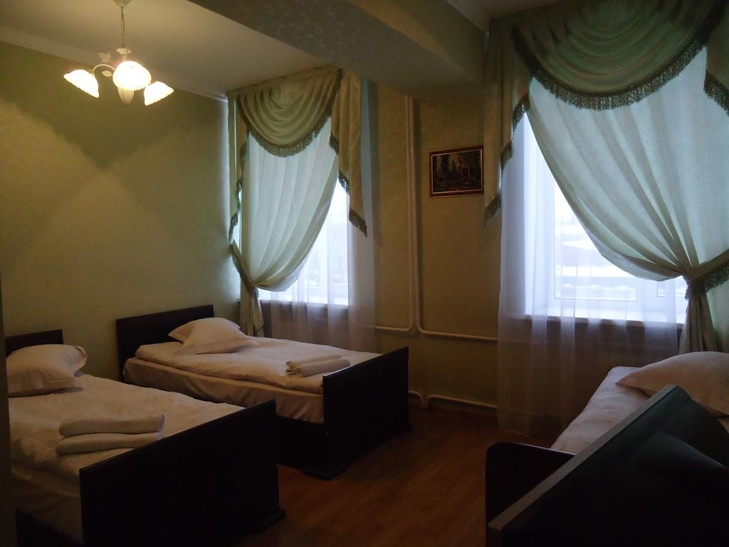 Трехместный (Бюджетный трехместный номер) отеля Altay, Риддер