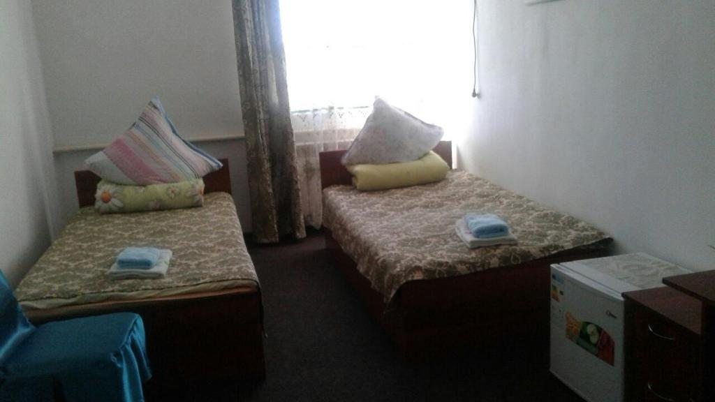 Двухместный (Двухместный номер с 1 кроватью или 2 отдельными кроватями, общая ванная комната) отеля Акнур, Бейнеу