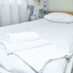 Четырехместный номер с 4 односпальными кроватями