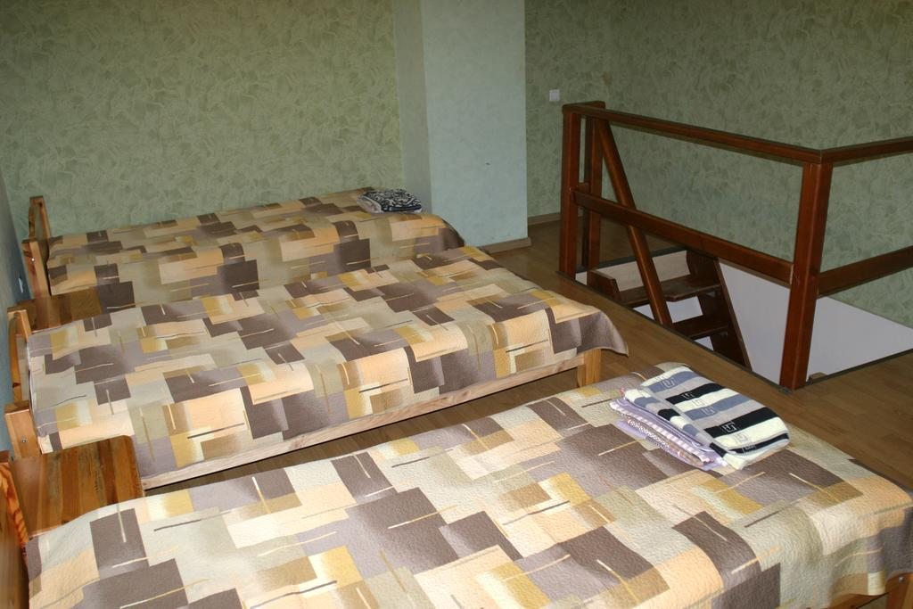 Номер (Кровать в общем номере с 3 кроватями.) отеля Олимпийский, Минск