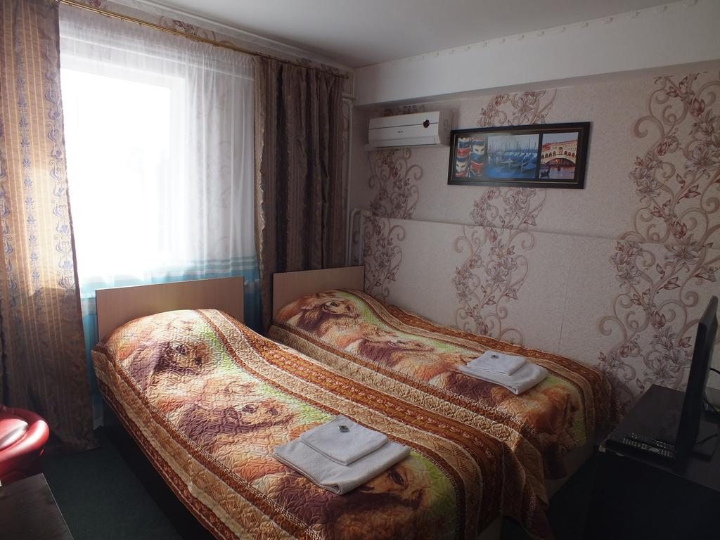Двухместный (Двухместный номер с 2 отдельными кроватями и балконом) отеля Плазма, Донской