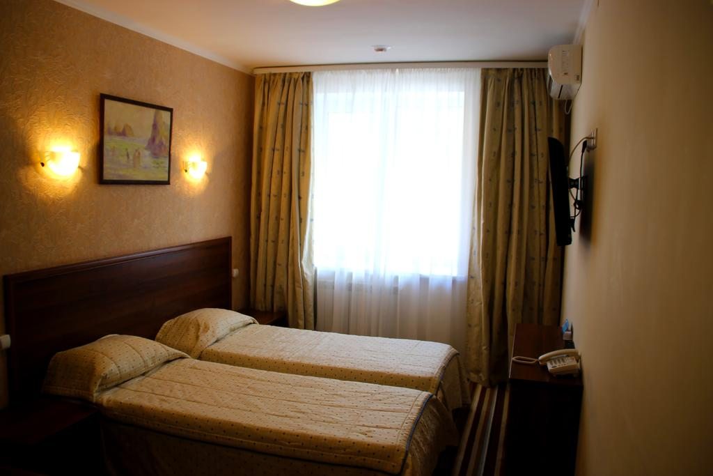 Двухместный (Стандартный двухместный номер с 2 отдельными кроватями) спа-отеля Источник, Тюмень