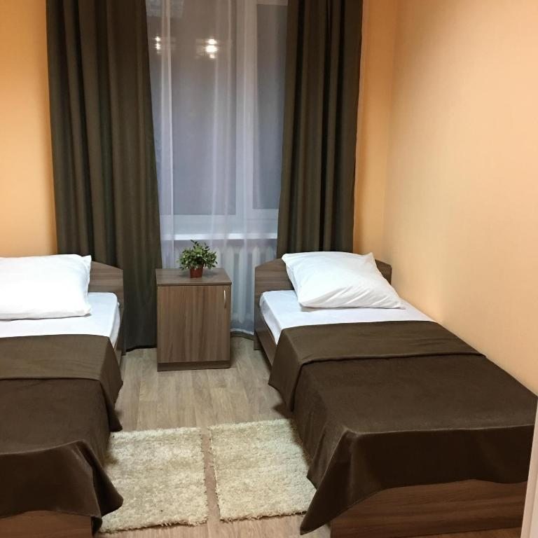 Двухместный (Двухместный номер с 2 отдельными кроватями и общей ванной комнатой) отеля Платон, Тамбов