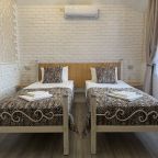 Комната с двумя односпальными кроватями