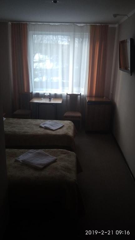Двухместный (Стандартный двухместный номер с 2 отдельными кроватями) отеля Ольгас, Глубокое, Витебская область