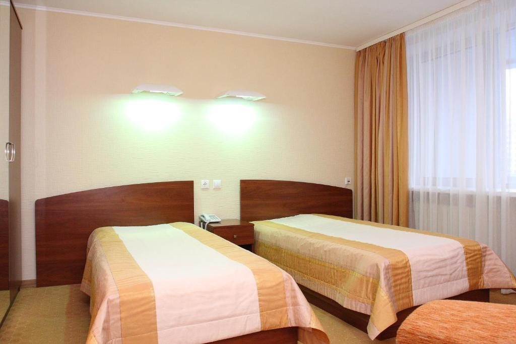 Двухместный (Двухместный номер с 2 отдельными кроватями и душем) отеля Славинаспорт, Жлобин