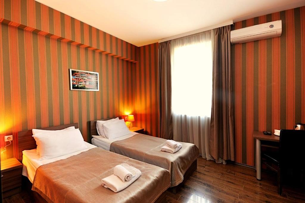 Двухместный (Стандартный двухместный номер с 1 кроватью или 2 отдельными кроватями) отеля Athletics, Тбилиси