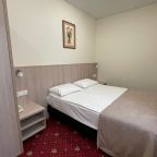 Стандартный номер, вид на спальное место.