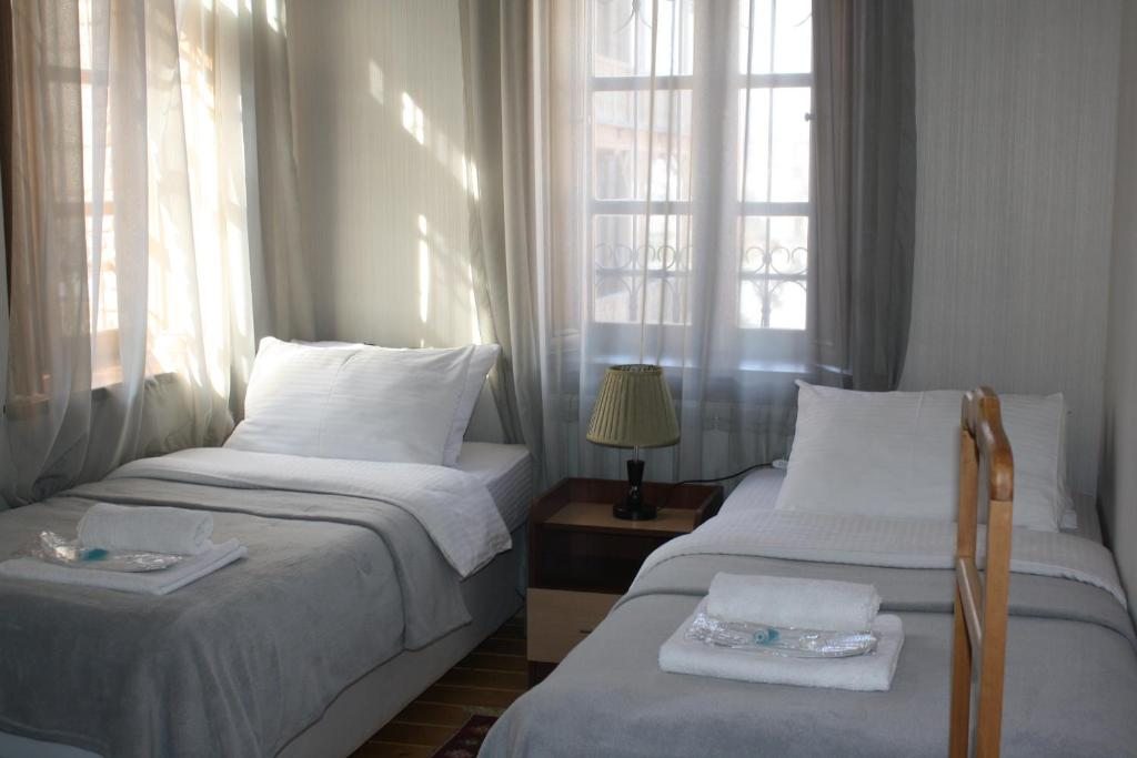 Двухместный (Двухместный номер с 2 отдельными кроватями и видом на город) гостевого дома Люси, Тбилиси
