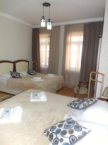 Четырехместный (Четырехместный номер с 2 кроватями размера «king-size») гостевого дома Люси, Тбилиси