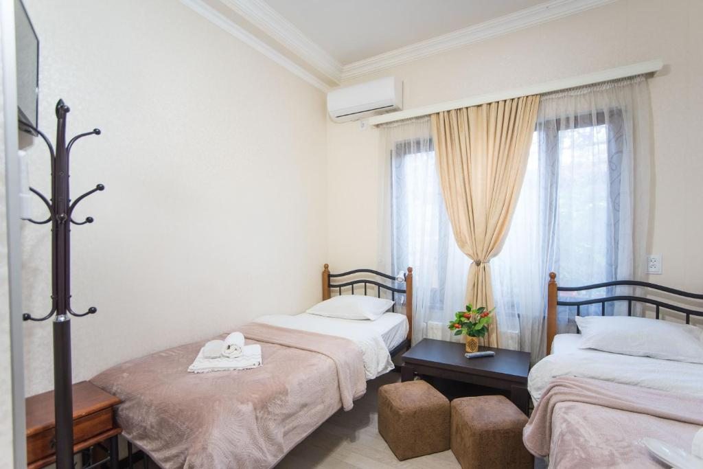 Двухместный (Двухместный номер с 2 отдельными кроватями) гостевого дома Near Opera, Тбилиси