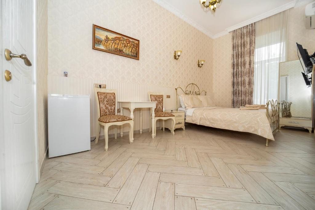 Сьюит (Люкс с кроватью размера «king-size») апарт-отеля Исторический Тбилиси