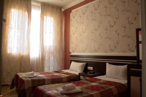 Двухместный (Двухместный номер с 2 отдельными кроватями и балконом) отеля Анталия, Тбилиси