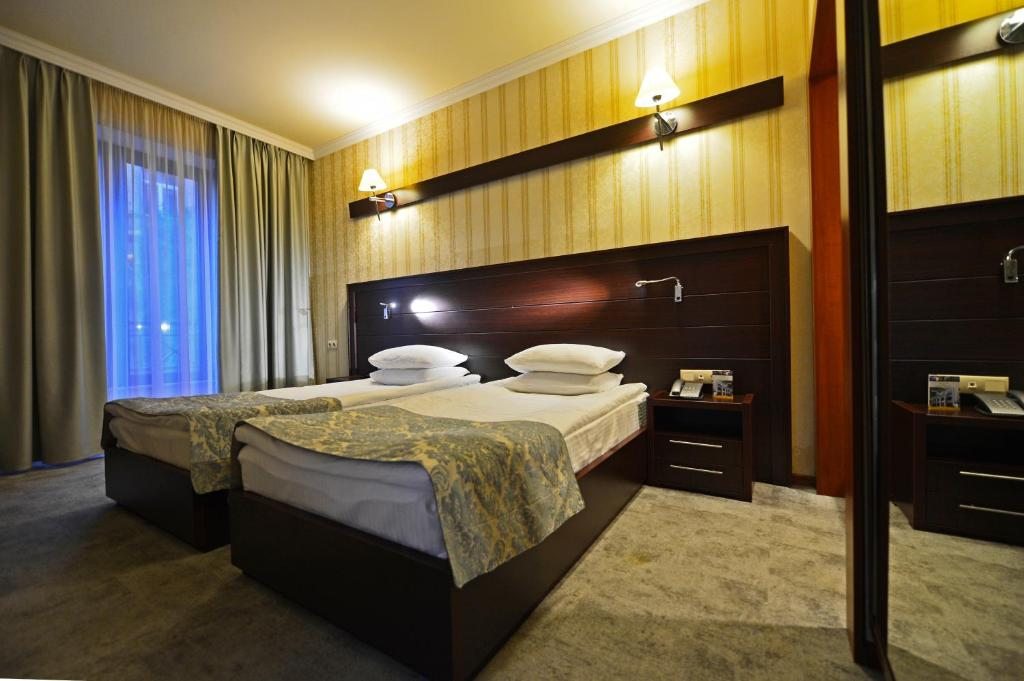 Двухместный (Стандартный двухместный номер с 2 отдельными кроватями) отеля Астория Тбилиси