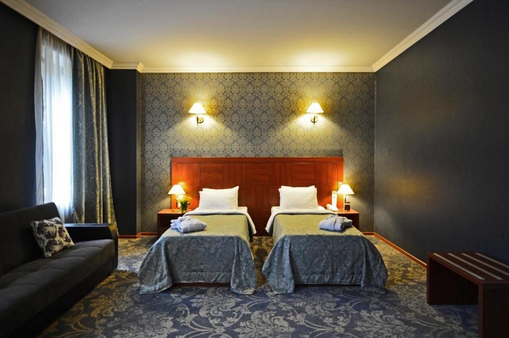 Двухместный (Двухместный номер Делюкс с 2 отдельными кроватями) отеля Астория Тбилиси