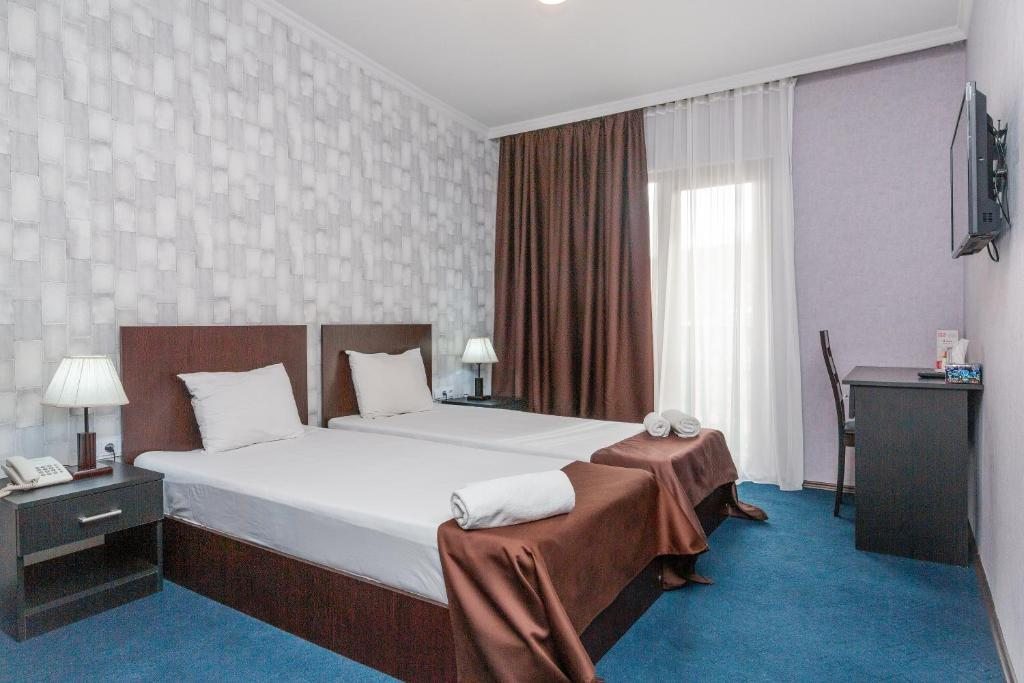 Двухместный (Двухместный номер с 2 отдельными кроватями) отеля Marlyn, Тбилиси