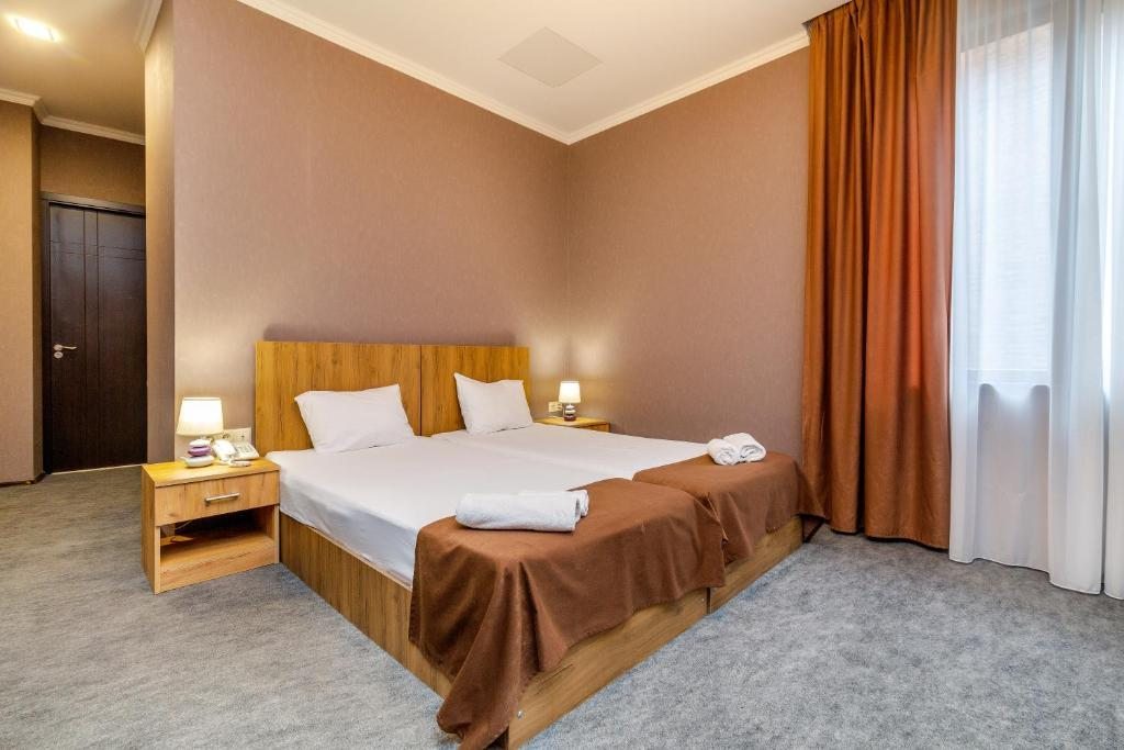Двухместный (Двухместный номер с 2 отдельными кроватями и балконом) отеля Marlyn, Тбилиси
