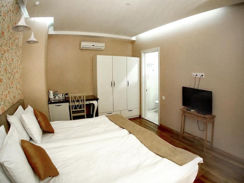 Двухместный (Улучшенный двухместный номер с 1 кроватью или 2 отдельными кроватями) отеля Nata, Тбилиси