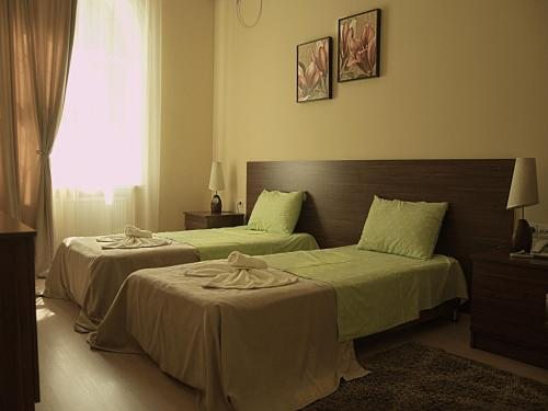 Двухместный (Стандартный двухместный номер с 1 кроватью или 2 отдельными кроватями) отеля Тбилиси Гарден
