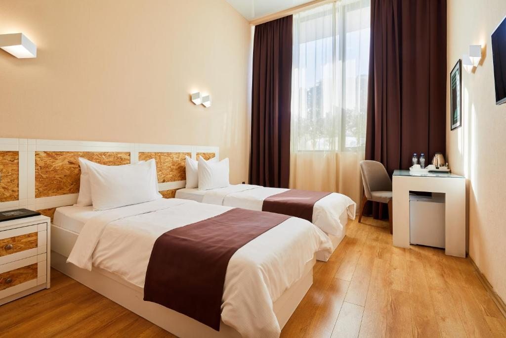 Двухместный (Двухместный номер эконом-класса с 2 отдельными кроватями) отеля Iveria Inn, Тбилиси