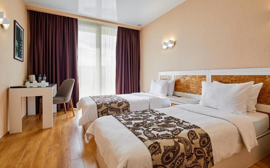Двухместный (Стандартный двухместный номер с 2 отдельными кроватями) отеля Iveria Inn, Тбилиси