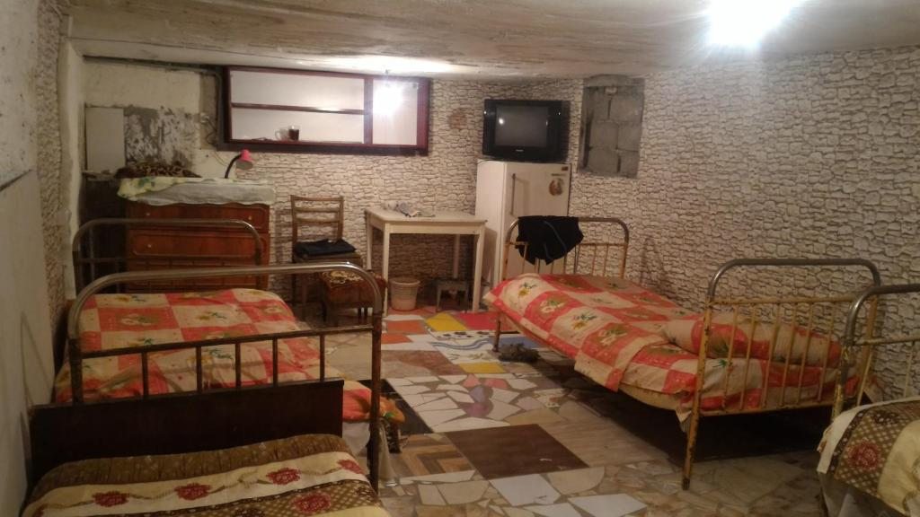 Номер (Кровать в общем номере с 4 кроватями) гостевого дома Лимон, Тбилиси