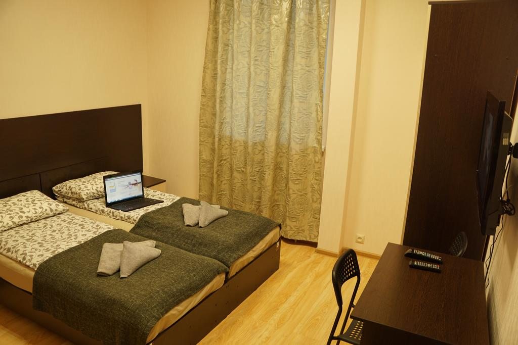 Номер (Односпальная кровать в общем номере для мужчин и женщин) отеля X.O., Балабаново