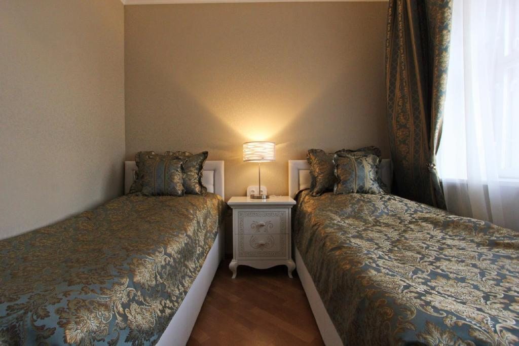 Двухместный (Двухместный номер «Комфорт» с 2 отдельными кроватями) мини-отеля Аполлон, Санкт-Петербург