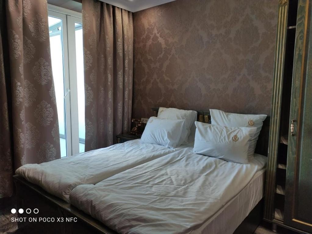 Двухместный (Двухместный номер с 2 отдельными кроватями и видом на город) отеля Neapol, Тбилиси