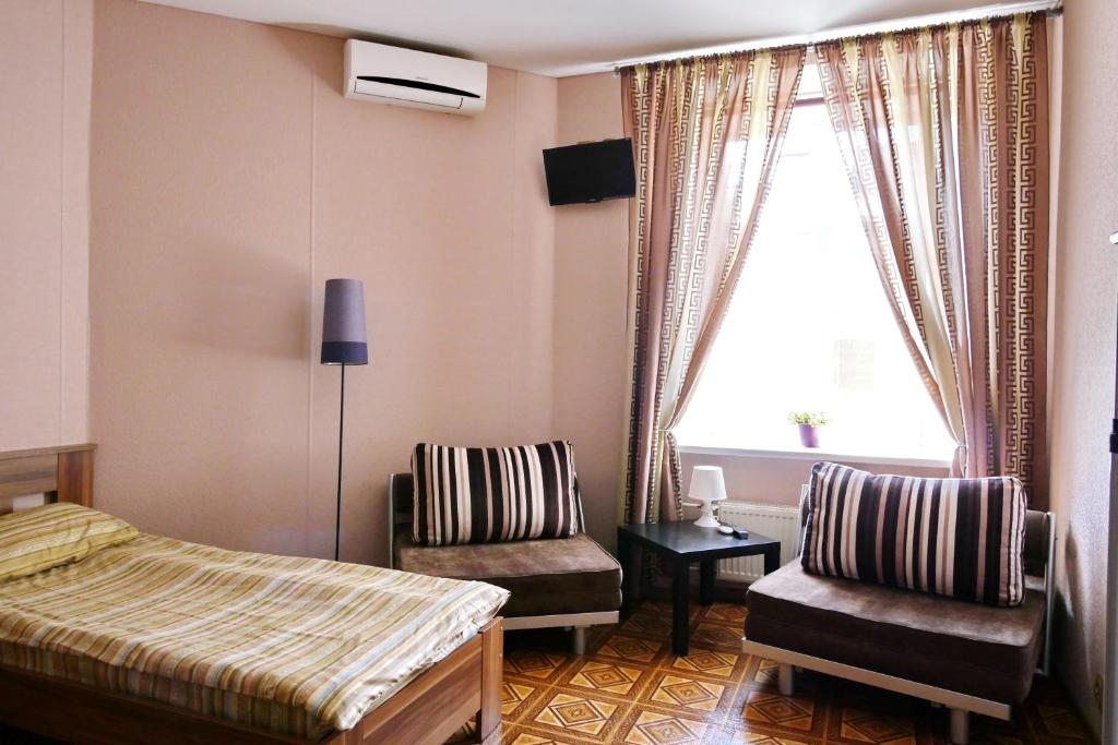 Двухместный (Улучшенный двухместный номер с 2 отдельными кроватями и общей ванной комнатой) гостевого дома Дива, Санкт-Петербург