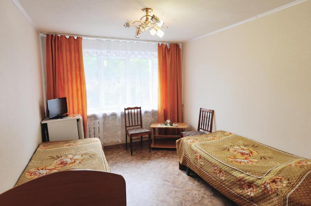 Двухместный (Бюджетный двухместный номер с 2 отдельными кроватями) отеля Спортивная, Киров