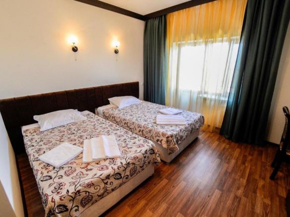 Фотография номера гостевого дома Виноградная лоза