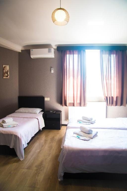 Трехместный (Трехместный номер с основными удобствами) отеля Prima Rooms, Тбилиси