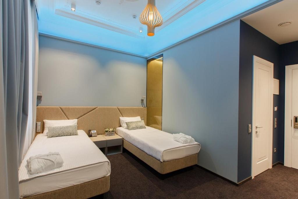 Двухместный (Улучшенный двухместный номер с 1 кроватью или 2 отдельными кроватями) отеля Итальянская, 29, Санкт-Петербург