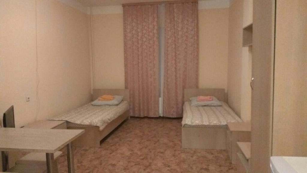 Двухместный (Двухместный номер с 2 отдельными кроватями) отеля СибПромСтрой, Сургут
