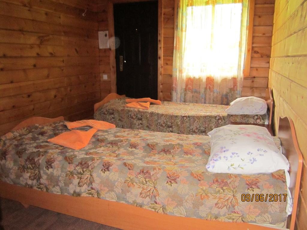 Двухместный (Двухместный номер с 2 отдельными кроватями) усадьбы Толстяка Мо, Чепош