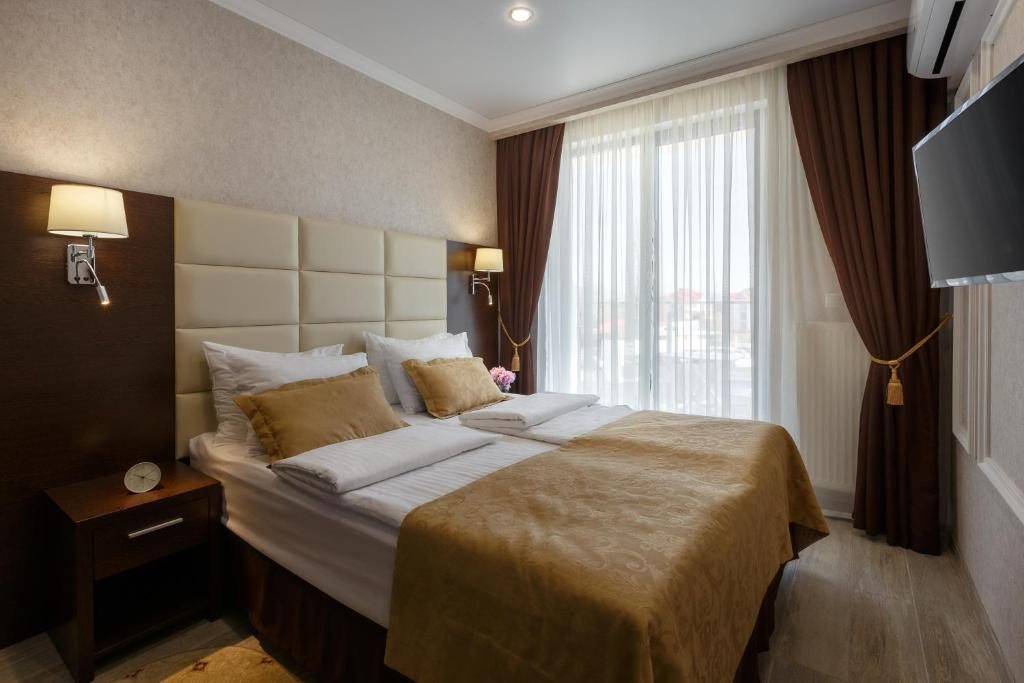 Двухместный (Стандартный двухместный номер с 1 кроватью или 2 отдельными кроватями и балконом) отеля Marine Palace, Геленджик