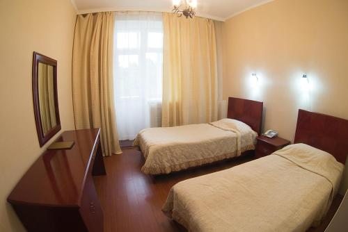 Двухместный (Двухместный номер с 2 отдельными кроватями) отеля Hotel Alma-Ata, Боровое (Акмолинская область)