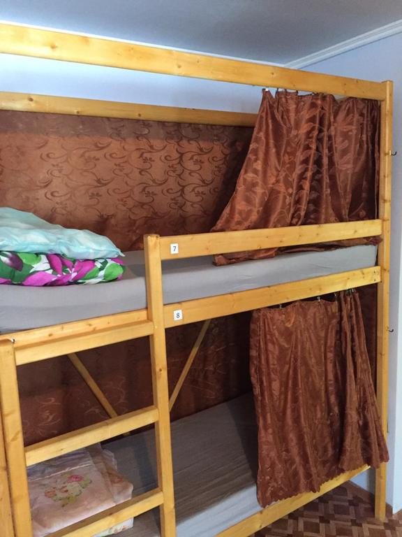 Номер (Спальное место на двухъярусной кровати в общем номере для мужчин) отеля Полярник в Лянторе