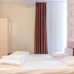 Номер с двумя кроватями в отеле Арфа-отель на Рязанском