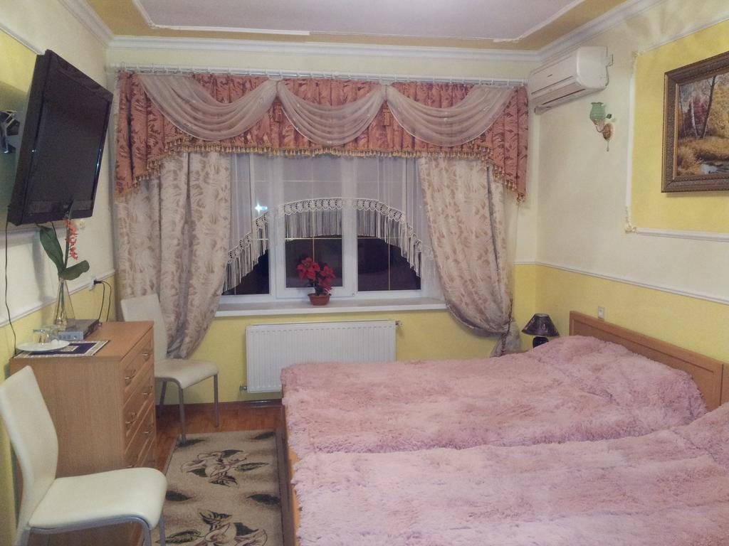 Двухместный (Двухместный номер с 2 двуспальными кроватями) мини-гостиницы Грэгори клаб, Каневская