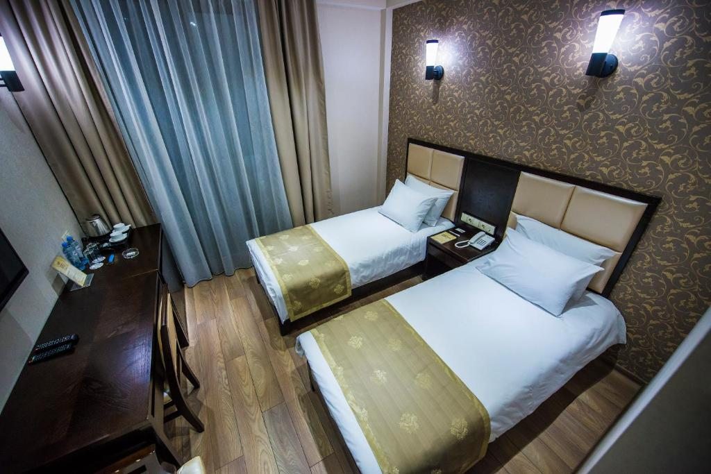 Двухместный (Двухместный номер с 2 отдельными кроватями - Первый этаж) отеля Tbilisi Inn, Тбилиси