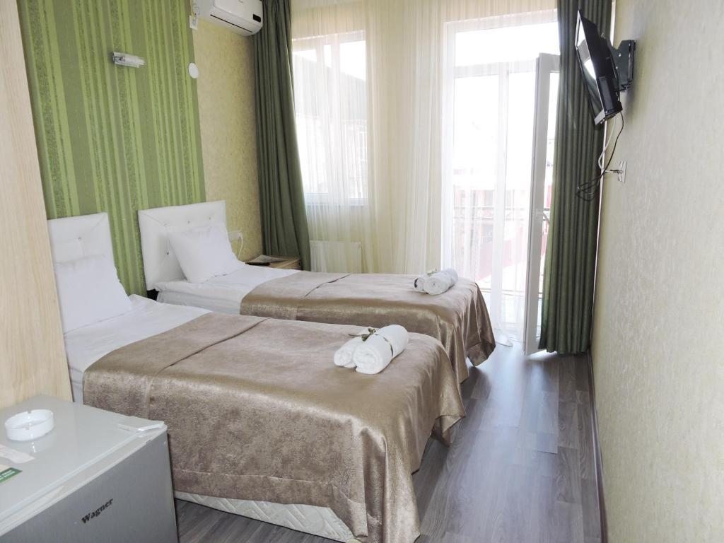 Двухместный (Стандартный двухместный номер с 2 отдельными кроватями) отеля Green Villa, Батуми
