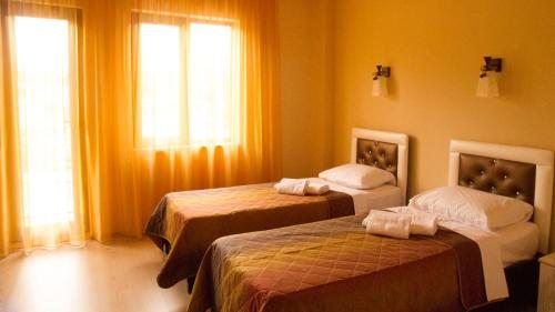Двухместный (Двухместный номер с 2 отдельными кроватями) отеля Iberia, Батуми