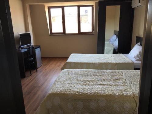 Двухместный (Стандартный двухместный номер с 2 отдельными кроватями) отеля Рива, Батуми